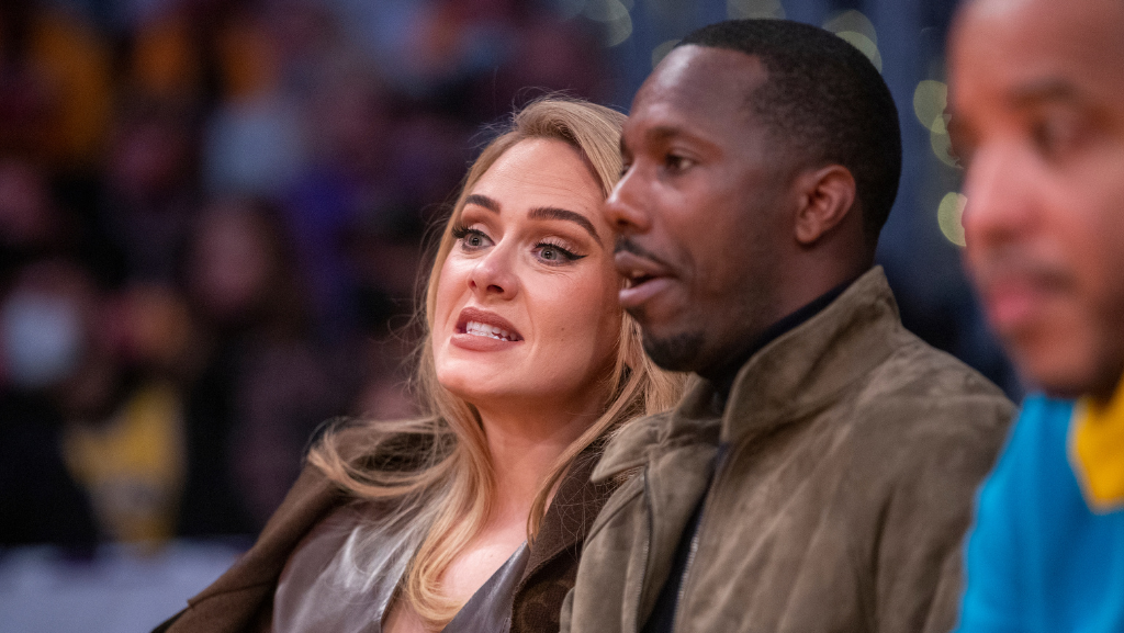 rich paul and adele at a basketball game