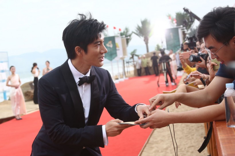 Actor/singer Wang Leehom arrives at the red carpet during the closing ceremony of 1st Hainan International Film Festival on December 16, 2018 in Sanya, Hainan Province of China.