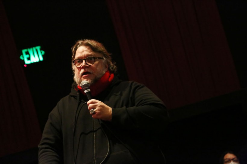 Director Guillermo del Toro speaks in front of the audience during the early access screening of 