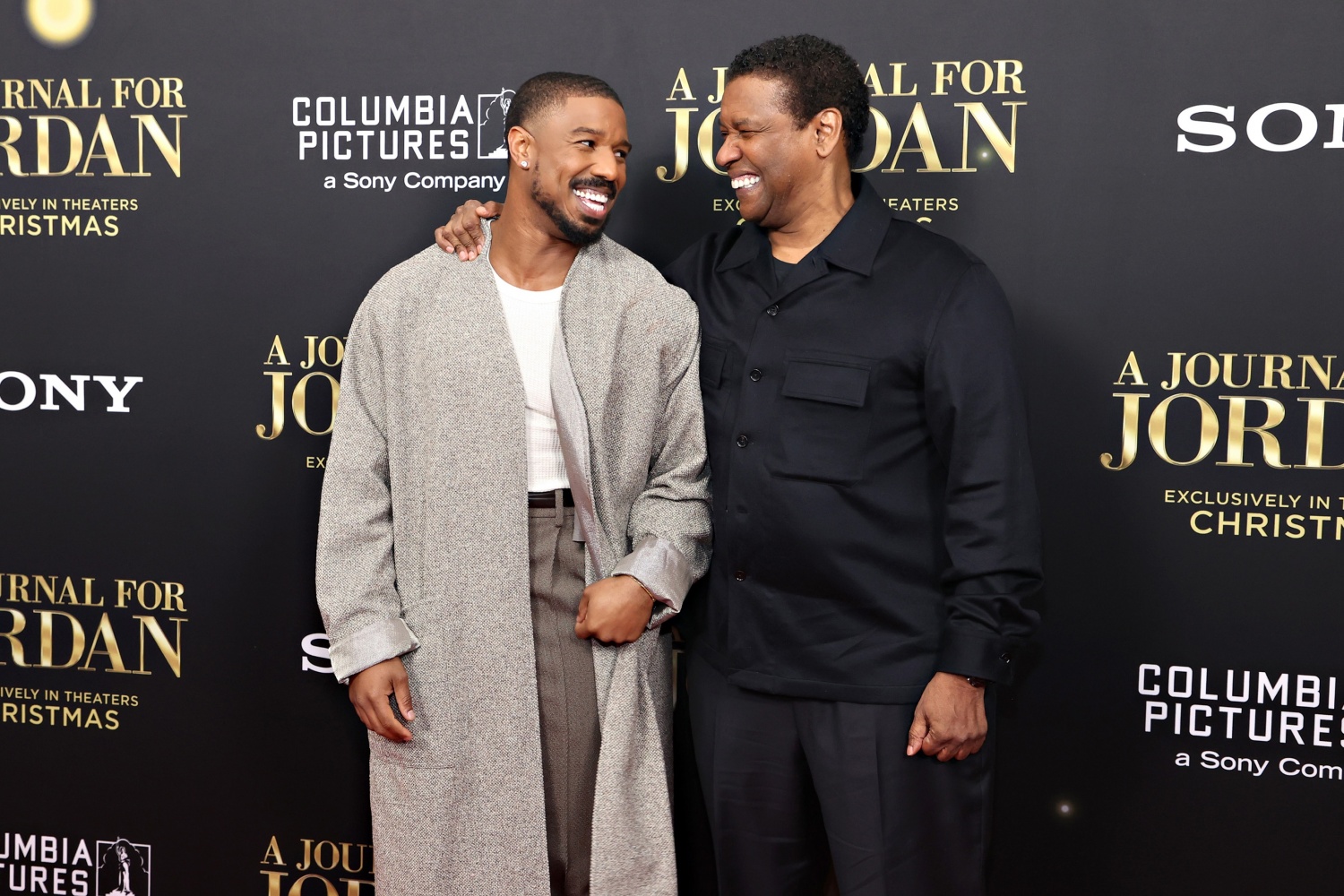 Michael B. Jordan (L) and Denzel Washington attend the "A Journal For Jordan" World Premiere at AMC Lincoln Square Theater on December 09, 2021 in New York City. 
