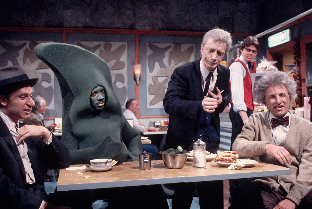 Eddie Murphy plays Gumby in a sketch with other actors, including Martin Short (third from right) for Saturday Night Live. 