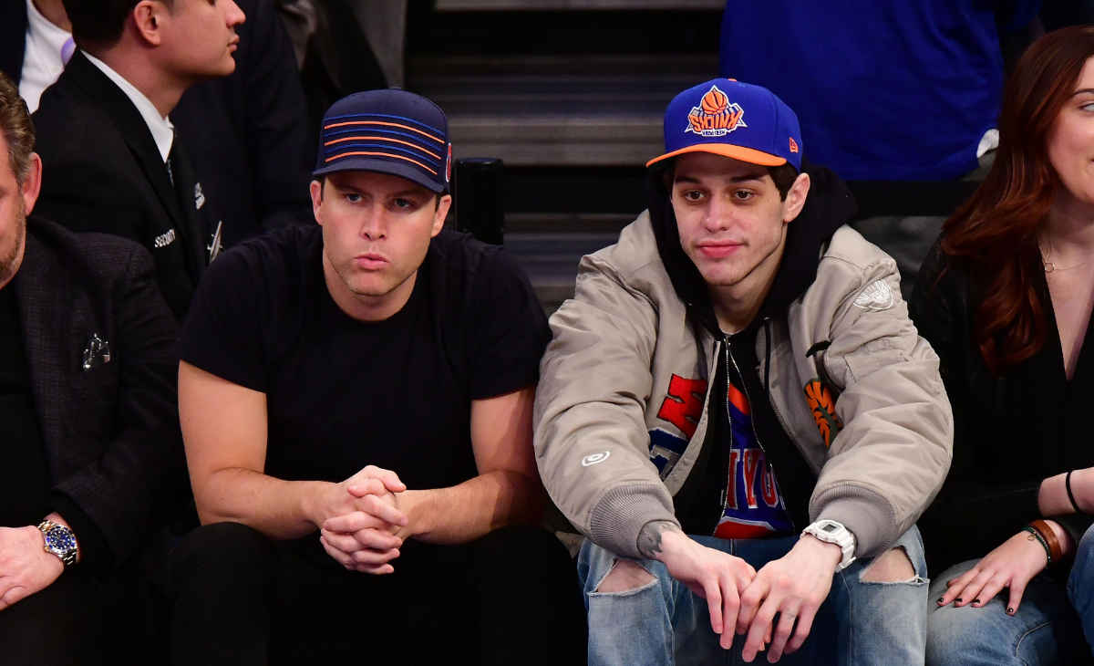 : Colin Jost and Pete Davidson attend the New York Knicks Vs Boston Celtics game at Madison Square Garden on December 21, 2017 in New York City. 