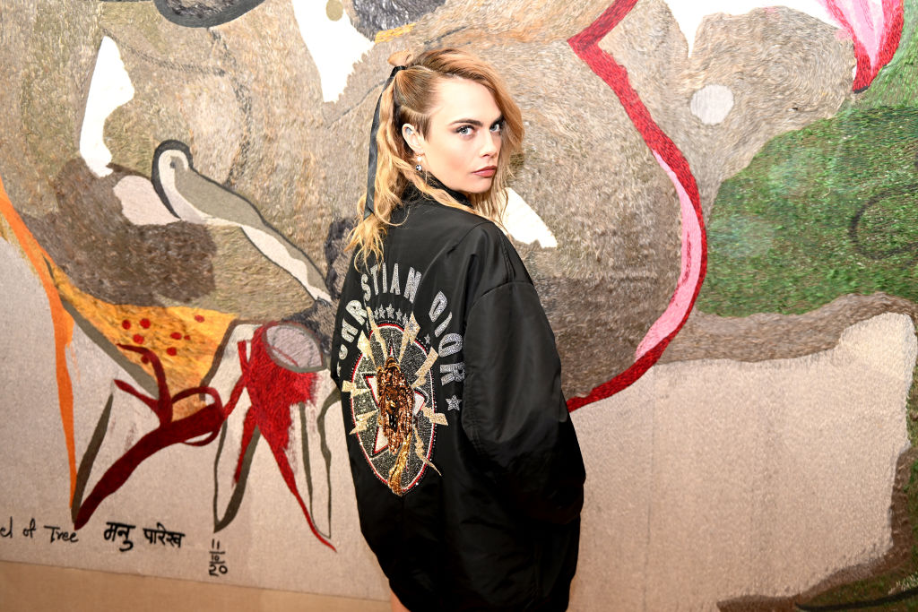 Cara Delevingne attends the Dior Haute Couture Spring/Summer 2022 show as part of Paris Fashion Week on January 24, 2022 in Paris, France.