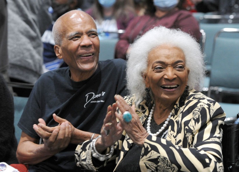 Nichelle Nichols and son Kyle Johnson attend Day 3 of the 2021 Los Angeles Comic Con held at Los Angeles Convention Center on December 5, 2021 in Los Angeles, California.