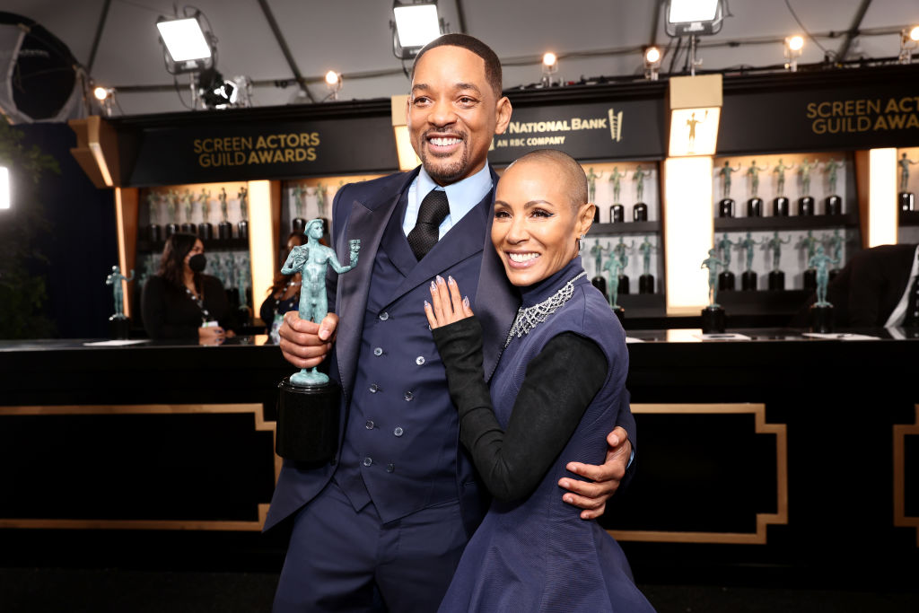 Will Smith, winner of Outstanding Performance by a Male Actor in a Leading Role for "King Richard", and Jada Pinkett Smith attend the 28th Screen Actors Guild Awards at Barker Hangar on February 27, 2022 in Santa Monica, California.