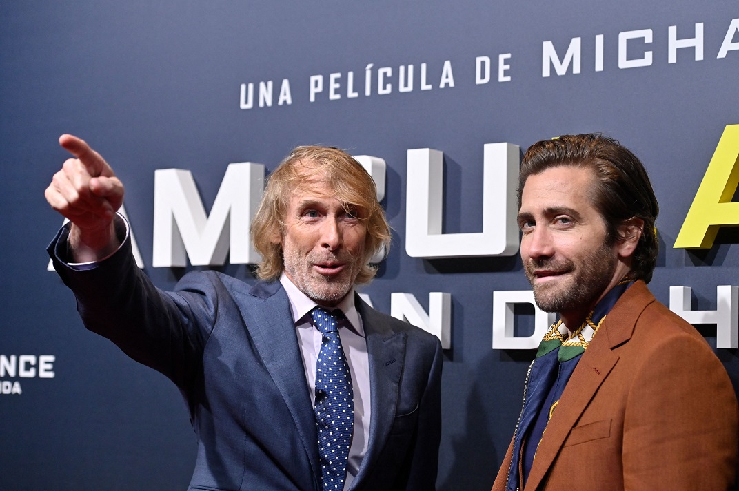 US director Michael Bay (L) and US actor Jake Gyllenhaal pose during a photocall for the premiere of the film "Ambulance" in Madrid on March 24, 2022. (Photo by Oscar DEL POZO / AFP) (Photo by OSCAR DEL POZO/AFP via Getty Images)