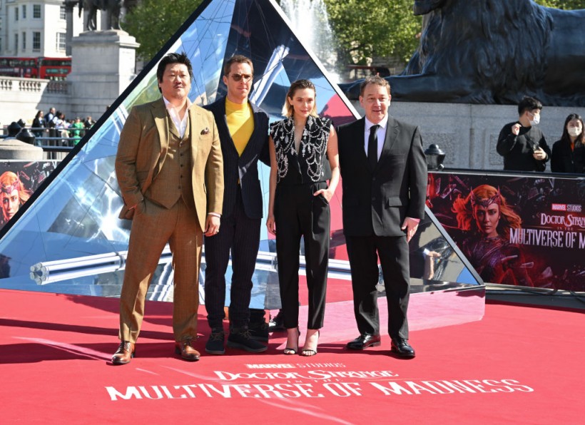 Benedict Wong, Benedict Cumberbatch, Elizabeth Olsen and Director Sam Raimi attend the 'Doctor Strange In The Multiverse Of Madness' Photocall at Trafalgar Sq in London, England. 