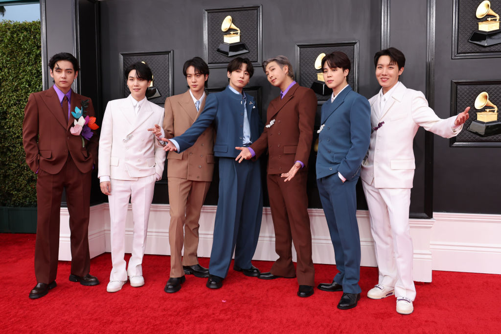 V, Suga, Jin, Jungkook, RM, Jimin and J-Hope of BTS attends the 64th Annual GRAMMY Awards at MGM Grand Garden Arena on April 03, 2022 in Las Vegas, Nevada. 