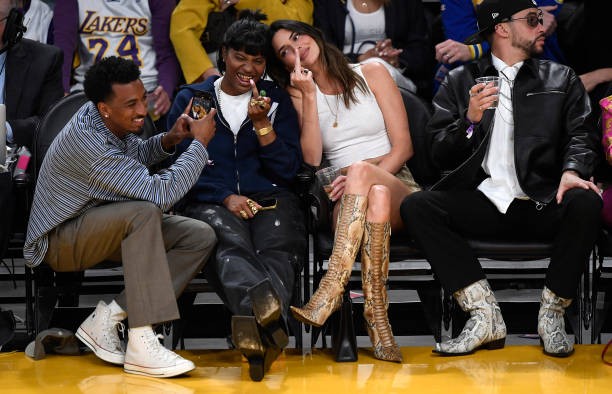 LOS ANGELES, CALIFORNIA - MAY 12: Yung Taco, Renell Medrano, Kendall Jenner and Bad Bunny attend the Western Conference Semifinal Playoff game between the Los Angeles Lakers and Golden State Warriors at Crypto.com Arena on May 12, 2023 in Los Angeles, California.