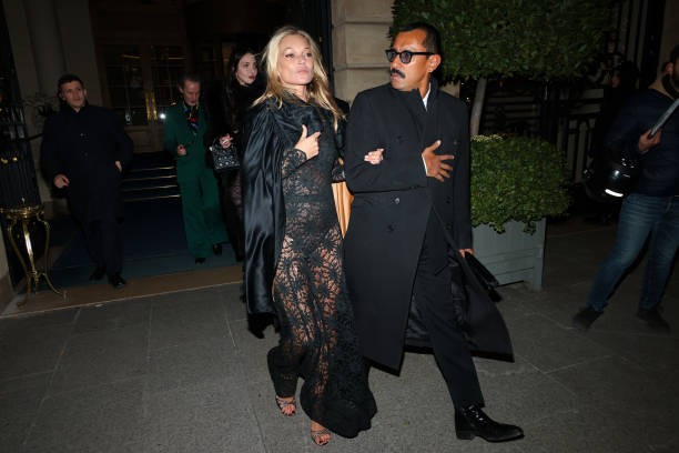 PARIS, FRANCE - JANUARY 16: Kate Moss and Haider Ackermann are seen leaving the Ritz Hotel to celebrate her 50th birthday on January 16, 2024 in Paris, France. 