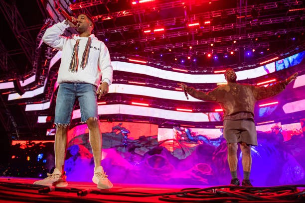 INDIO, CALIFORNIA - APRIL 20: Kid Cudi and Kanye West perform during 2019 Coachella Valley Music And Arts Festival on April 20, 2019 in Indio, California.