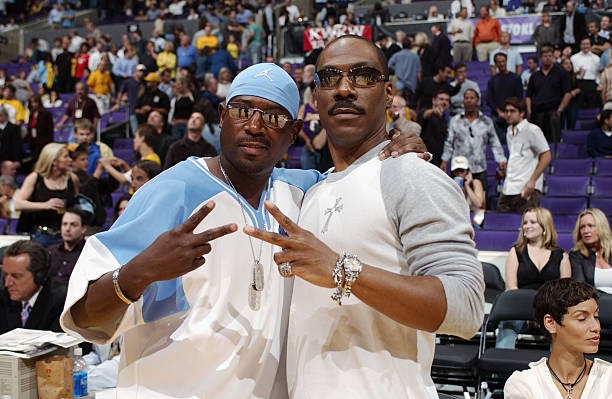 LOS ANGELES - MAY 15: Actor Martin Lawrence (L) and Eddie Murphy pose for a picture prior to Game six between the San Antonio Spurs and the Los Angeles Lakers of the Western Conference Semifinals during the 2003 NBA Playoffs at Staples Center on May 15, 2003 in Los Angeles, California. The Spurs won 110-82.