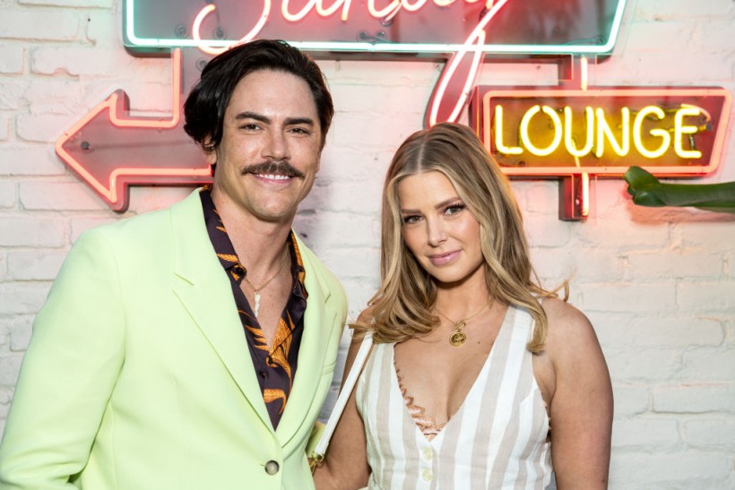 LOS ANGELES, CALIFORNIA - JULY 26: Television personalities Tom Sandoval (L) and Ariana Madix attend the Friends and Family Opening at Schwartz & Sandy's with the cast of 