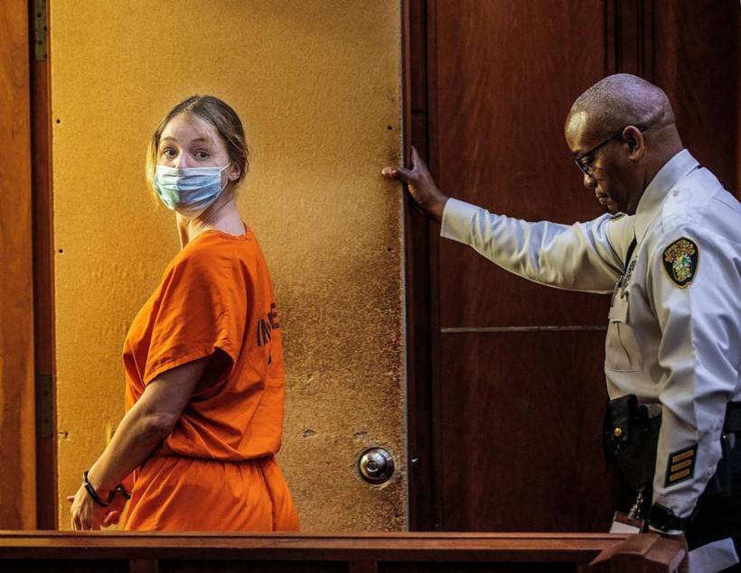 Courtney Clenney is being taken away, during an evidentiary hearing on Sept. 6, 2022, in Miami. She is the OnlyFans model accused of murdering her boyfriend Christian Obumsel on April 3, 2022. (Pedro Portal/Miami Herald/Tribune News Service via Getty Images)