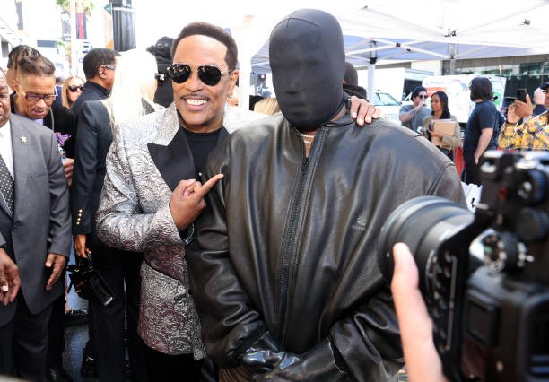 HOLLYWOOD, CALIFORNIA - JANUARY 29: Charlie Wilson (L) and Kanye West attend the ceremony as Charlie Wilson is honored with star on the Hollywood Walk Of Fame on January 29, 2024 in Hollywood, California. 