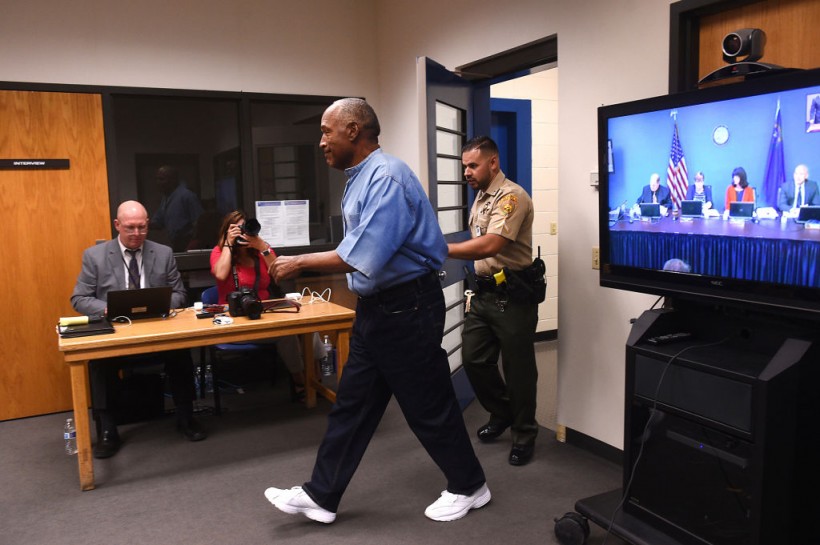 Former professional football player O.J. Simpson arrives for a parole hearing at Lovelock Correctional Center in Lovelock, Nevada, U.S. on Thursday, July 20, 2017. Simpson may learn, as early as Thursday afternoon, whether the Nevada Board of Parole Commissioners will decide to free him in the fall or whether he will continue to serve a nine-to-33-year sentence for 12 convictions, including kidnapping and armed robbery, stemming from a 2007 sting operation in which he tried to recover sports memorabilia from two collectors. Photographer: Jason Bean/Pool via Bloomberg