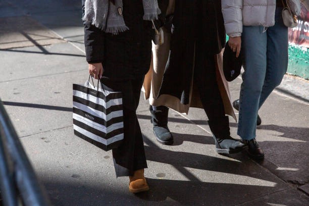 A shopper carries a Sephora bag in the Soho neighborhood of New York, US, on Monday, Jan. 22, 2024. US consumers rang in the new year with a good dose of optimism about the economy, their incomes and the inflation outlook, driving a gauge of confidence to a more than two-year high.