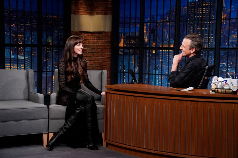 LATE NIGHT WITH SETH MEYERS -- Episode 1482 -- Pictured: (l-r) Actress Dakota Johnson during an interview with host Seth Meyers on February 7, 2024 -- (Photo by: Lloyd Bishop/NBC via Getty Images)