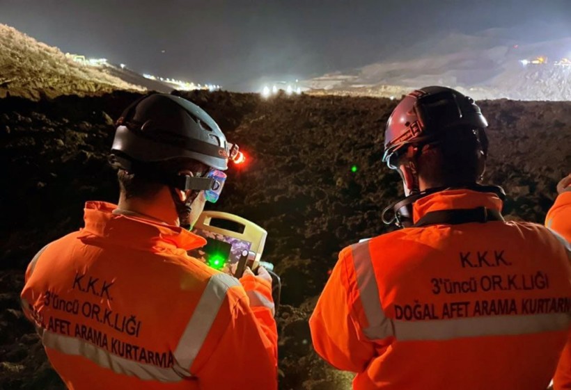 Rescuers work at the scene of a landslide in a gold mine area in the Ilic district of Erzincan Province, Türkiye, on Feb. 13, 2024. At least nine workers were believed to be trapped in a landslide in a gold mine area on Tuesday in the Ilic district, local NTV reported, citing local authorities. (Photo by Mustafa Kaya/Xinhua via Getty Images)