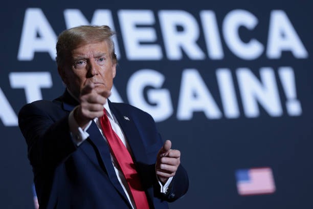 NORTH CHARLESTON, SOUTH CAROLINA - FEBRUARY 14: Republican presidential candidate, former U.S. President Donald Trump gestures to supporters after speaking at a Get Out The Vote rally at the North Charleston Convention Center on February 14, 2024 in North Charleston, South Carolina. South Carolina holds its Republican primary on February 24. 