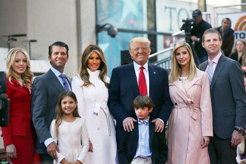 Donald Trump stands with his wife Melania Trump (center left) and from right: Eric Trump, Ivanka Trump, Donald Trump Jr. and Tiffany Trump