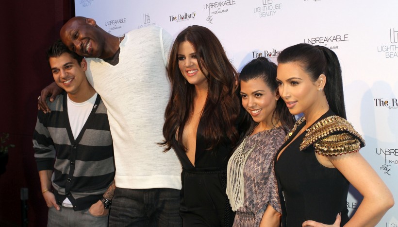 (L-R) Rob Kardashian, Lamar Odom, Khloe Kardashian Odom, Kourtney Kardashian and Kim Kardashian