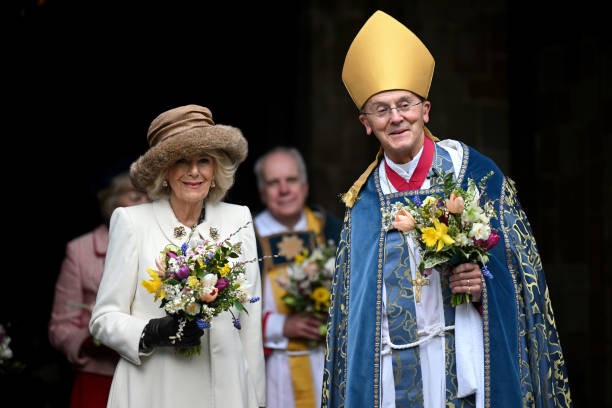 WORCESTER, ENGLAND - MARCH 28: Queen Camilla leaves the Royal Maundy Service with Bishop of Worcester Cathedral, The Right Reverend Dr John Inge.