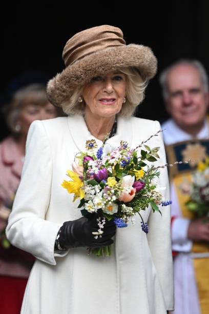 WORCESTER, ENGLAND - MARCH 28: Queen Camilla leaves the Royal Maundy Service where she distributed the Maundy money to 75 men and 75 women.