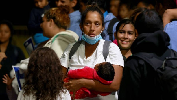 UNITED STATES -September 6: Members of the Cumales/Suarez family (kids age 13, 12, 8, 3 and month old -No first names given) from Venezuela along along with dozens of other migrants/immigrants families are seen arriving from Texas at the Port Authority Bus Terminal early Wednesday September 6, 2023. 