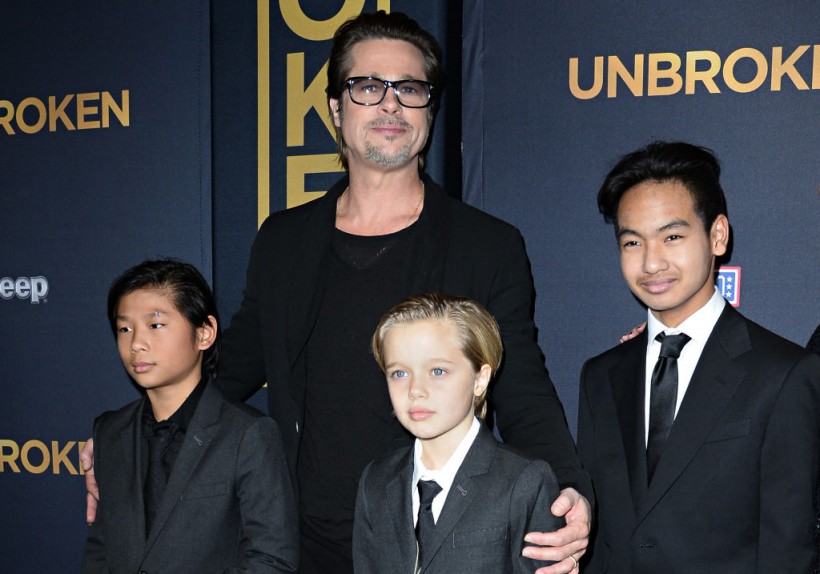 Brad Pitt and children Pax Jolie-Pitt (L), Shiloh Jolie-Pitt (C) and Maddox Jolie-Pitt
