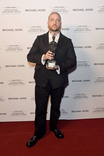 LONDON, ENGLAND - NOVEMBER 24: Jamie Lloyd poses in the winners room at the 65th Evening Standard Theatre Awards In Association With Michael Kors at London Coliseum on November 24, 2019 in London, England. 