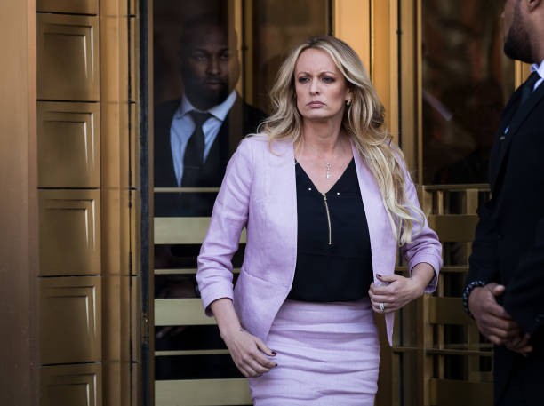 NEW YORK, NY - APRIL 16: Adult film actress Stormy Daniels (Stephanie Clifford) exits the United States District Court Southern District of New York for a hearing related to Michael Cohen, President Trump's longtime personal attorney and confidante, April 16, 2018 in New York City. Cohen and lawyers representing President Trump are asking the court to block Justice Department officials from reading documents and materials related to Cohen's relationship with President Trump that they believe should be protected by attorney-client privilege. Officials with the FBI, armed with a search warrant, raided Cohen's office and two private residences last week. 