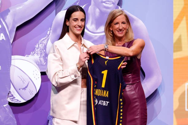 NEW YORK, NEW YORK - APRIL 15: Caitlin Clark poses with WNBA Commissioner Cathy Engelbert after being selected first overall pick by the Indiana Fever during the 2024 WNBA Draft at Brooklyn Academy of Music on April 15, 2024 in New York City. 