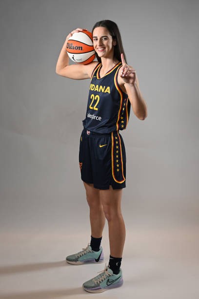 INDIANAPOLIS, IN - APRIL 17: Caitlin Clark #22 of the Indiana Fever poses for a portrait at Gainbridge Fieldhouse during her introductory press conference on April 17, 2024 at Gainbridge Fieldhouse in Indianapolis, Indiana. NOTE TO USER: User expressly acknowledges and agrees that, by downloading and or using this Photograph, user is consenting to the terms and conditions of the Getty Images License Agreement. Mandatory Copyright Notice: Copyright 2024 NBAE 