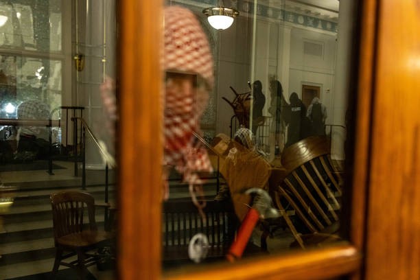 NEW YORK, NEW YORK - APRIL 30: Demonstrators supporting Palestinians in Gaza barricade themselves inside Hamilton Hall, an academic building which has been occupied in past student movements, on April 30, 2024 in New York City. 
