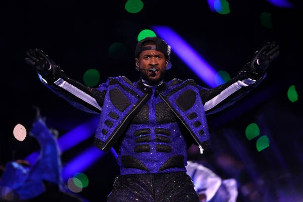 LAS VEGAS, NEVADA - FEBRUARY 11: Usher performs onstage during the Apple Music Super Bowl LVIII Halftime Show at Allegiant Stadium on February 11, 2024 in Las Vegas, Nevada. 
