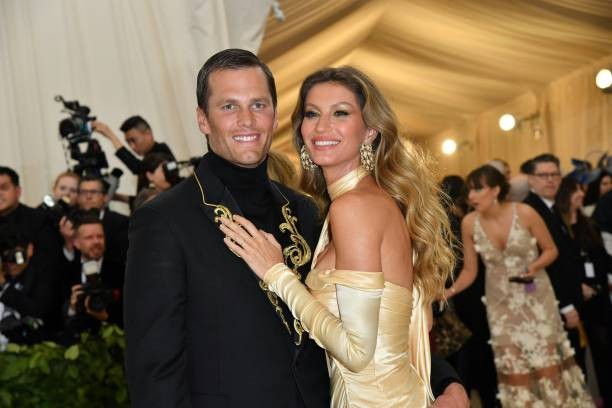 Tom Brady (L) and Gisele Bundchen arrive for the 2018 Met Gala on May 7, 2018, at the Metropolitan Museum of Art in New York.