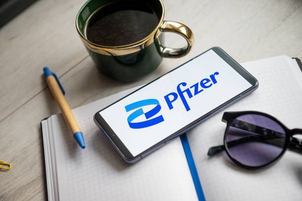 POLAND - 2024/01/31: In this photo illustration a Pfizer logo seen displayed on a smartphone.