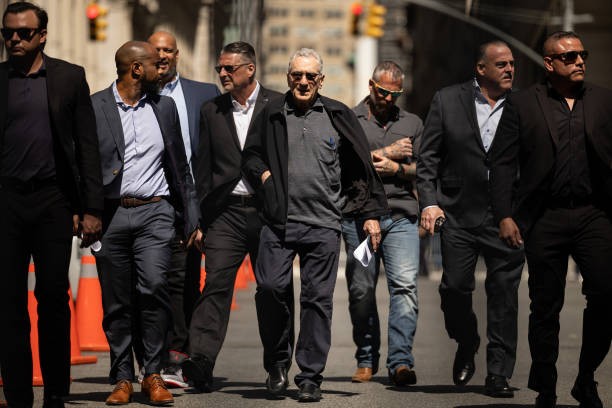 Actor Robert De Niro, center, arrives for a news conference outside Manhattan criminal court in New York, US, on Tuesday, May 28, 2024.