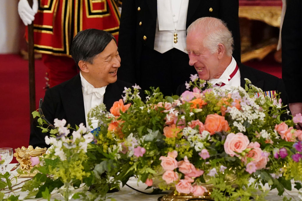 King Charles III (R) talks with Emperor Naruhito of Japan
