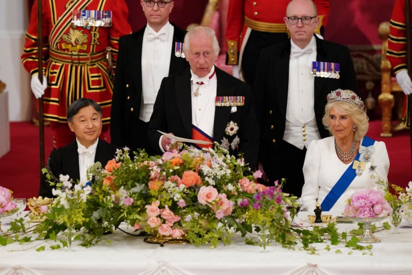 King Charles III delivers a speech as Queen Camilla and Emperor Naruhito of Japan (L) 