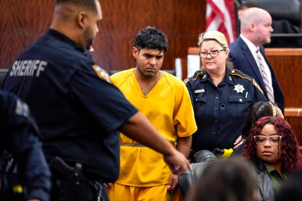 HOUSTON, TEXAS - JUNE 25: Johan Jose Rangel-Martinez, one of the two men accused of killing 12-year-old Jocelyn Nungaray, is led from the courtroom by deputies on Tuesday, June 25, 2024 in Houston. 