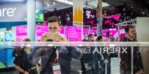 Journalists and visitors check new Sony Xperia devices on the opening day of the World Mobile Congress at the Fira Gran Via Complex on February 22, 2016 in Barcelona, Spain.