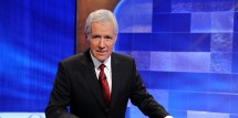Alex Trebek poses on the set of the 