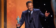 Will Smith accepts the award for Outstanding Performance by a Male Actor in a Leading Role for ‘King Richard’ onstage during the 28th Annual Screen Actors Guild Awards at Barker Hangar 