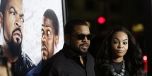 Cast member Ice Cube and his wife Kimberly Woodruff pose at the premiere of 